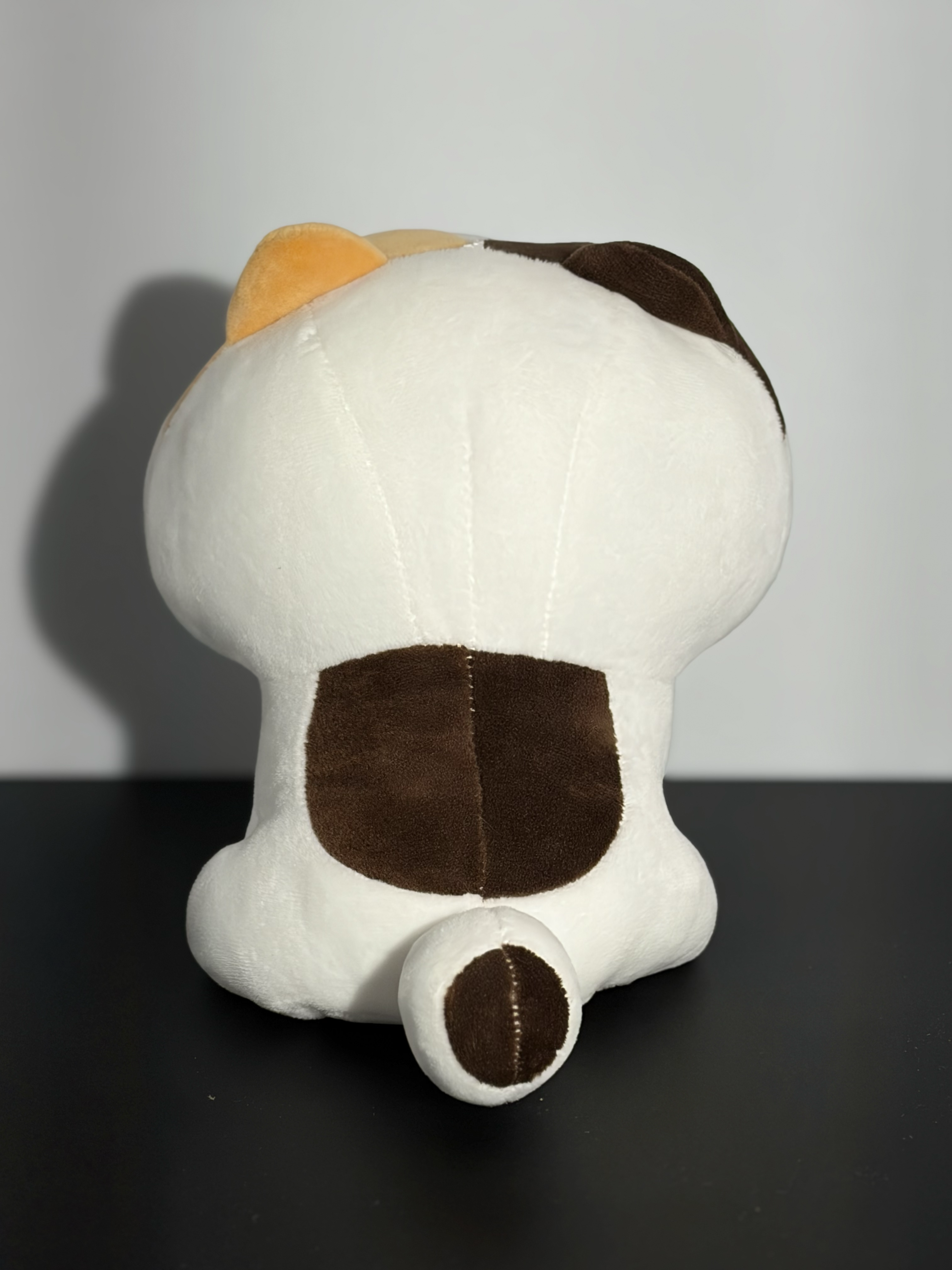 The back of a cat plushy