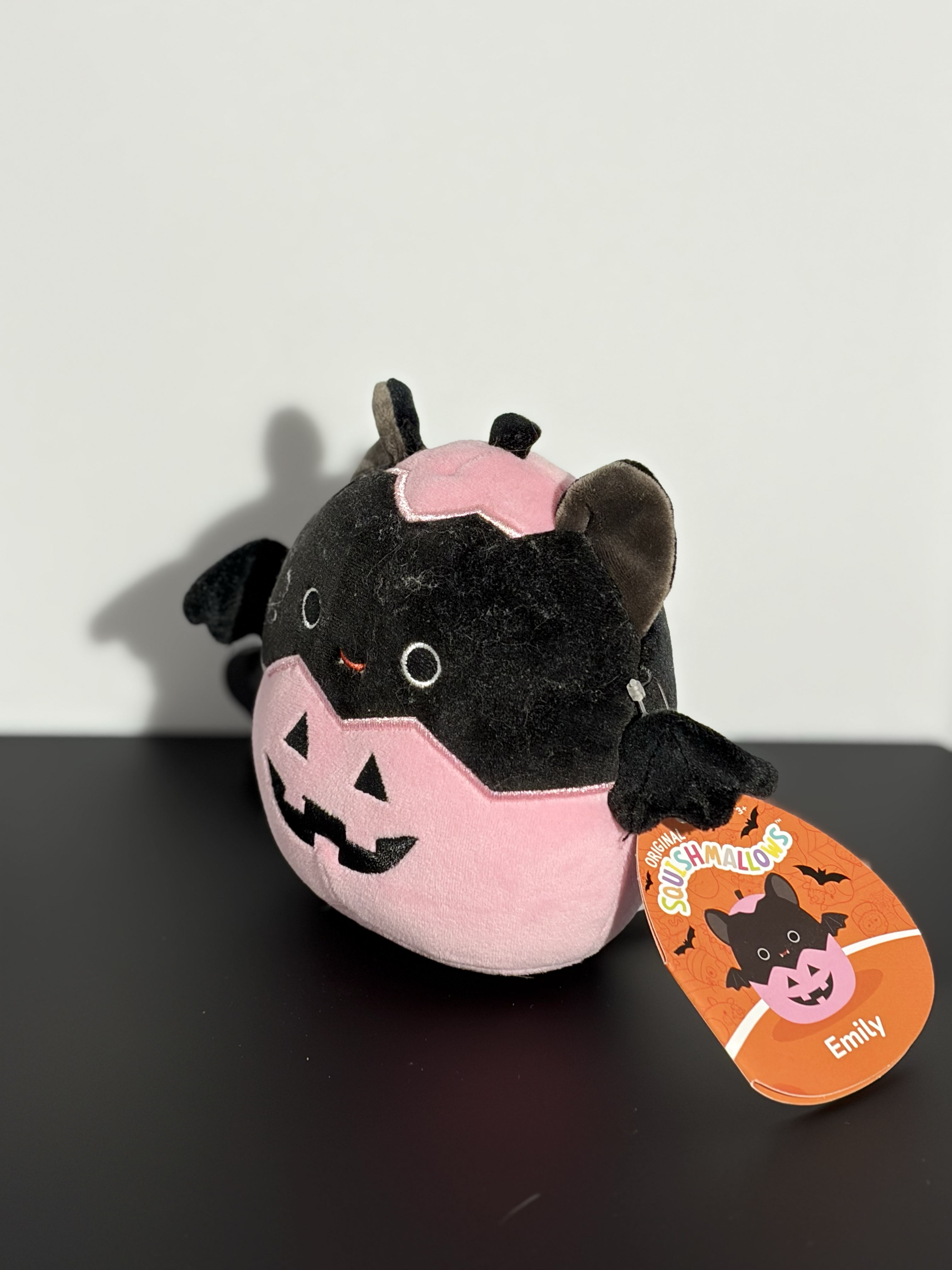 3:4 view of a cat plushy.