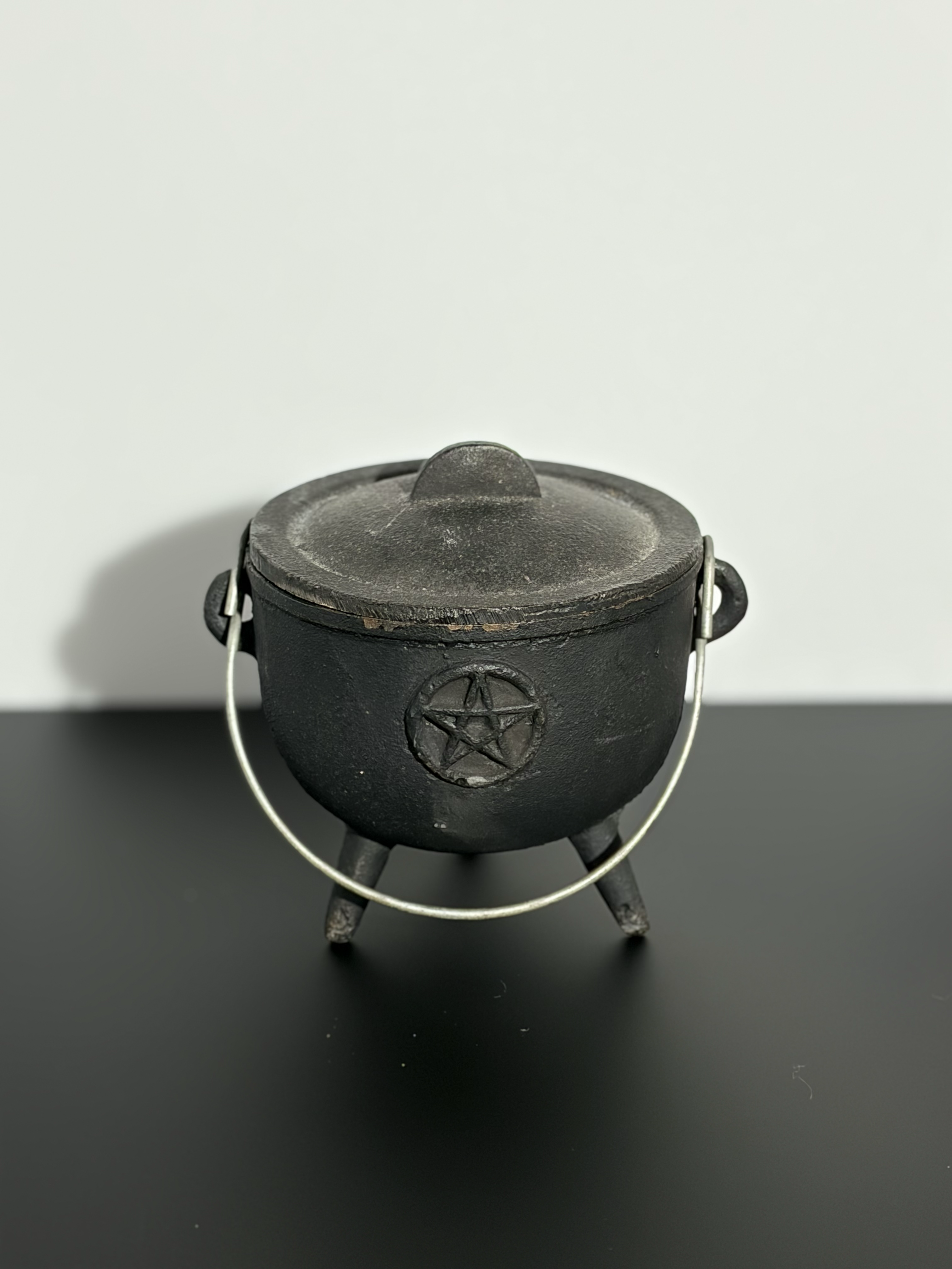 Front view of a cauldron.