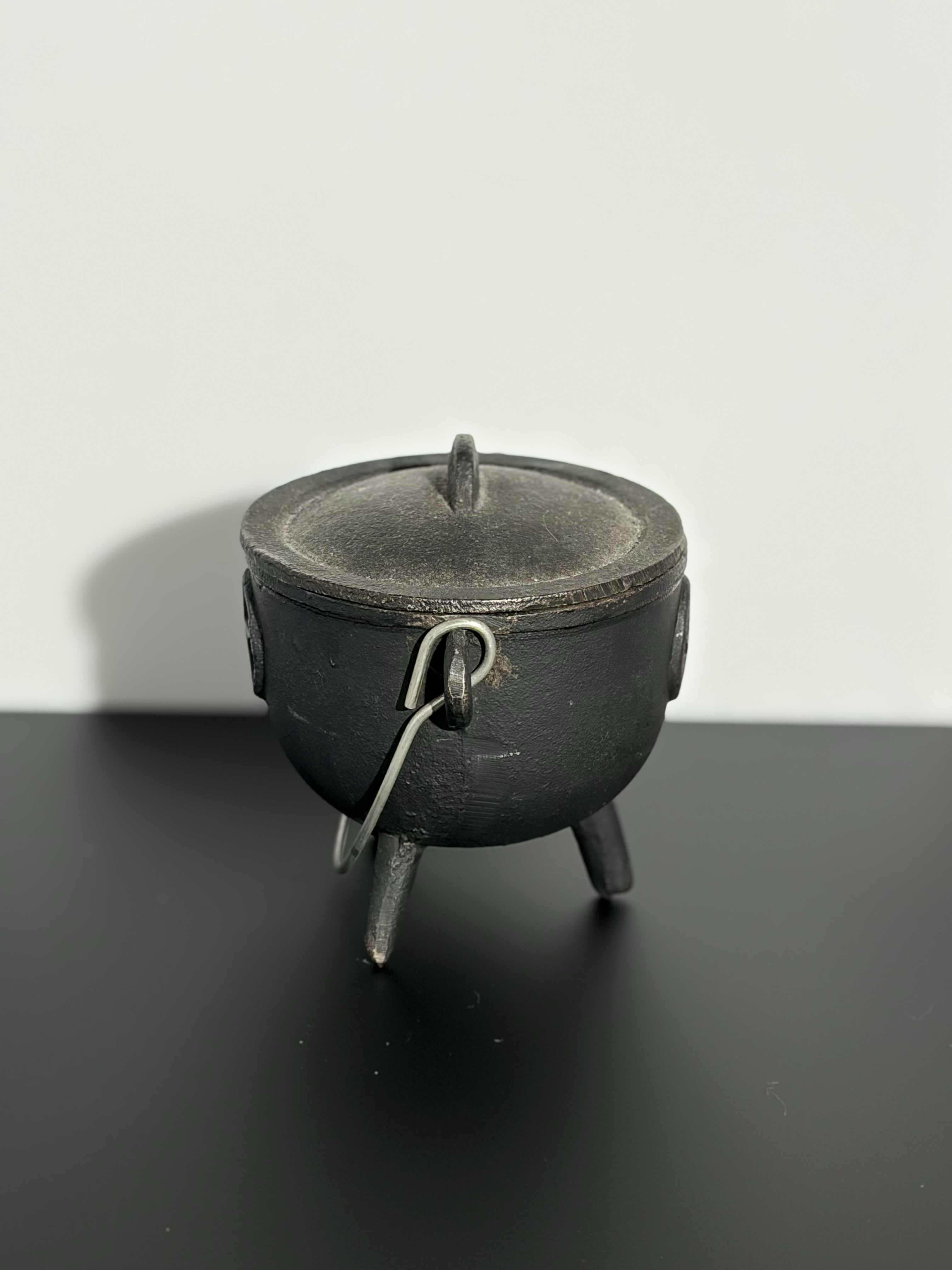 Side view of a cauldron.